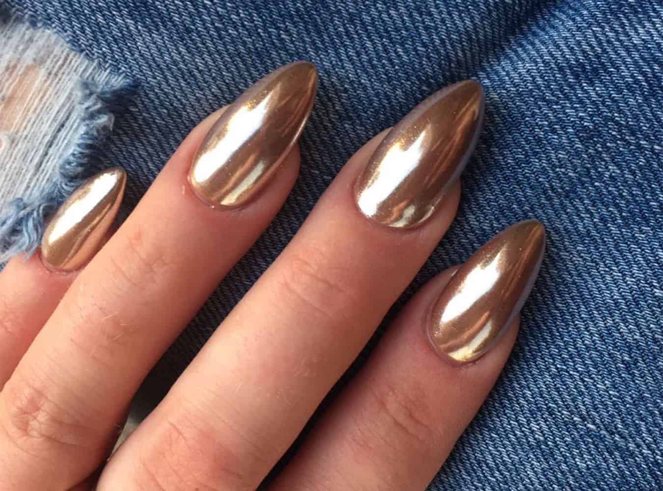 7. "Gold Chrome Nail Polish" - wide 5